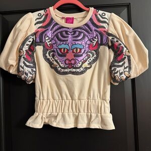 QUEEN OF SPARKLES Cream Peplum Top with Purple, Black and Red Tiger Design - XS